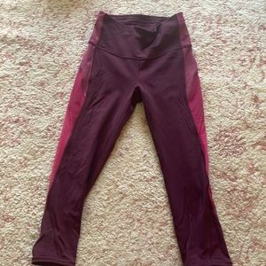 Maroon and Pink Lululemon crop leggings with Mesh cut outs